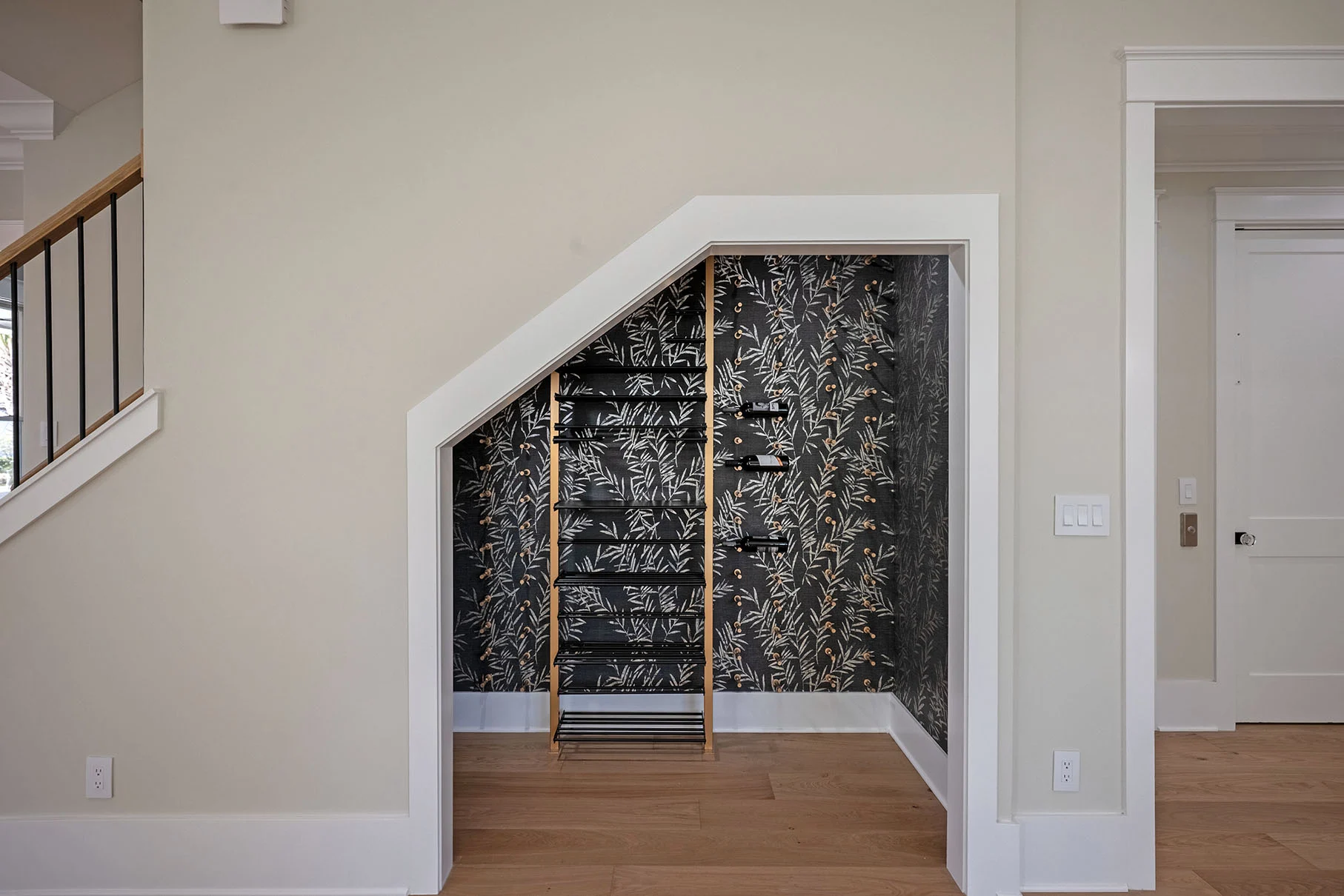 Wine room with steel-and-glass barn door