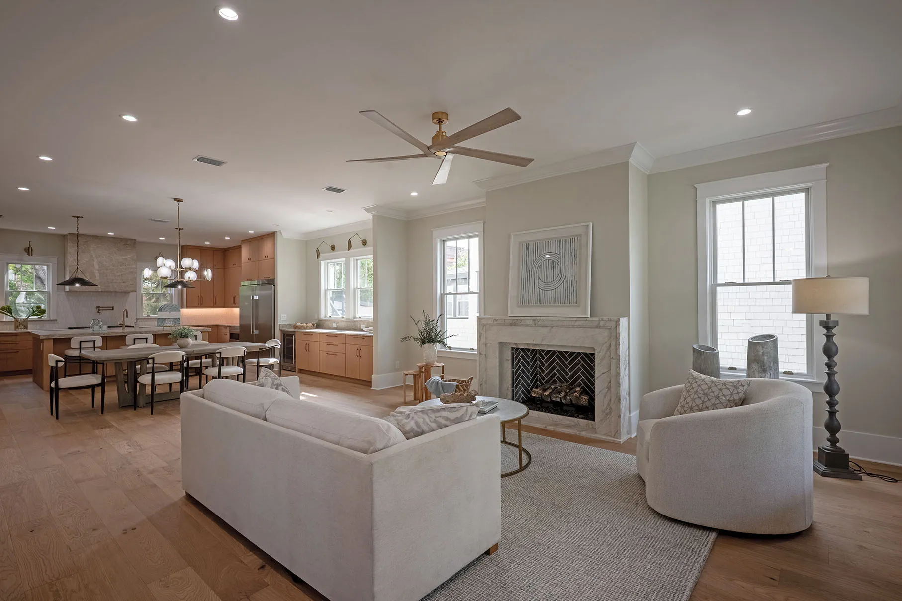 The great room, open to the kitchen, beneath ten-foot ceilings