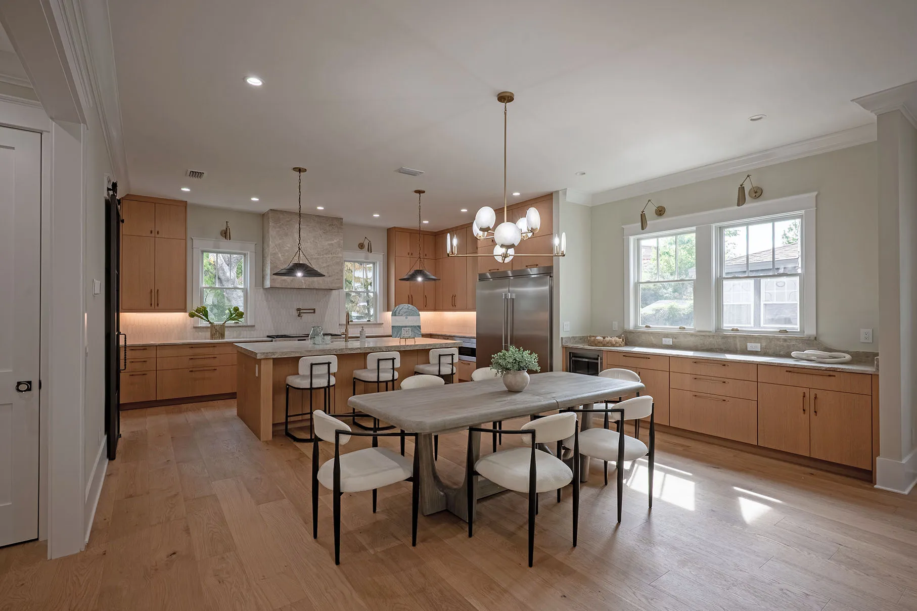 Chef's kitchen and casual dining, open to the great room